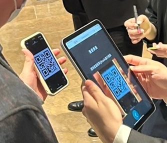 藍訊科技執行2025新光三越好夥伴新春聯歡會 貴賓QRCode報到/QRCode簡訊發送+客製化拉霸抽獎